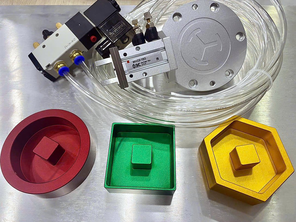 Pneumatic gripper and training parts for pick-and-place and sorting